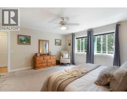 Bedroom - 128 Waterstone Place Se, Airdrie, AB T4B2G1 Photo 16