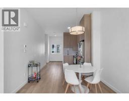 Primary Bedroom - 406, 101 Panatella Square Nw, Calgary, AB T3K2R9 Photo 7