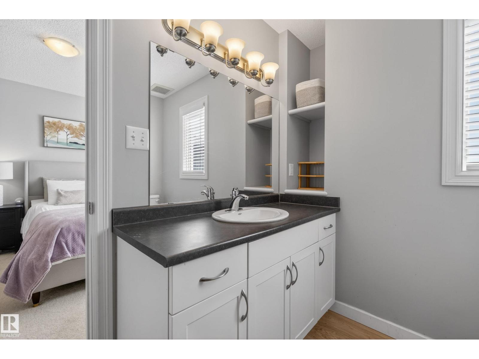 1148 35 Avenue NW, Tamarack — photo 23 of 30: Property photo