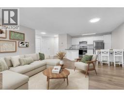 Living room - 118, 6800 Hunterview Drive Nw, Calgary, AB T2K6K5 Photo 7