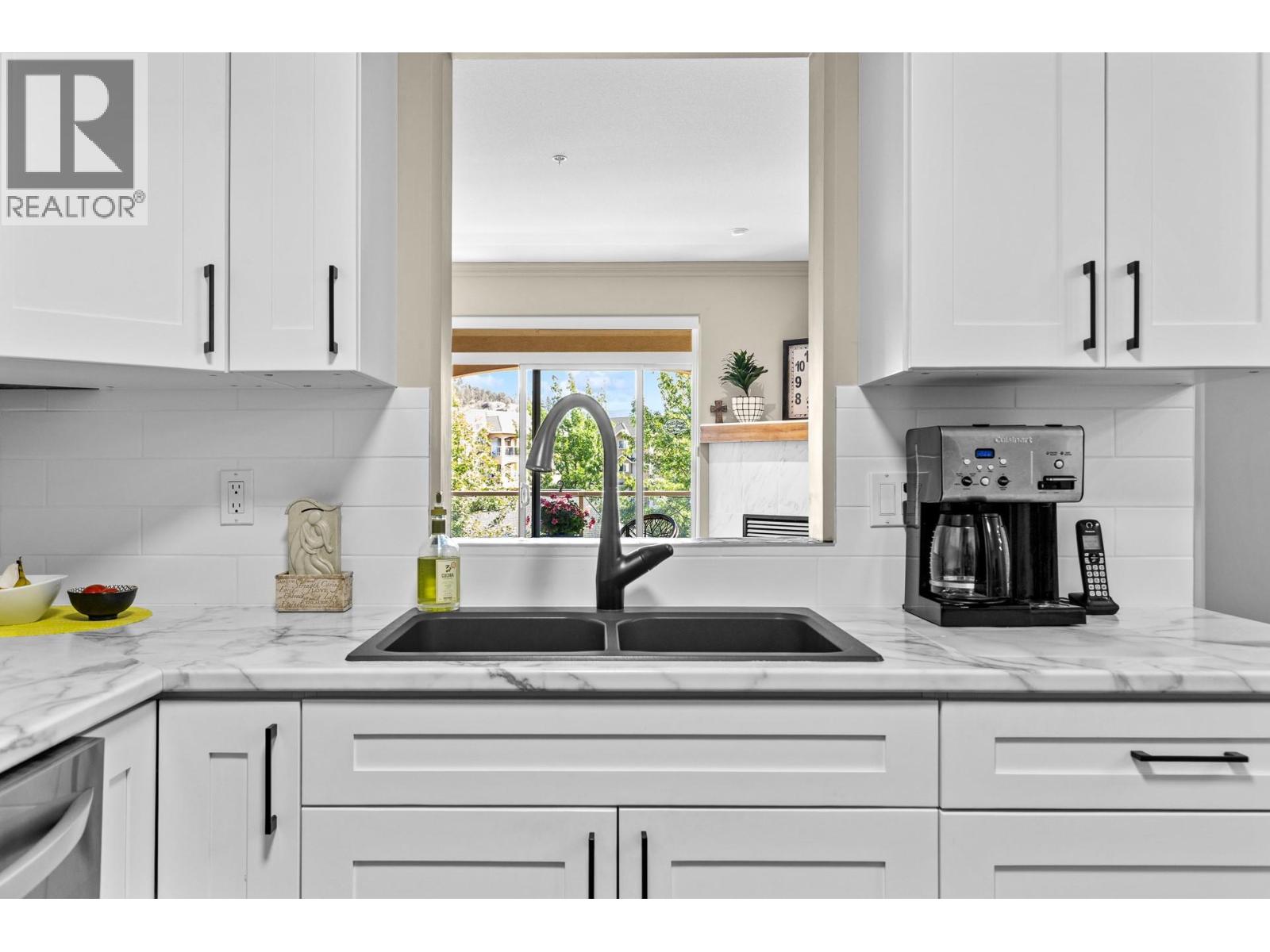 305 1960 Enterprise Way, Kelowna