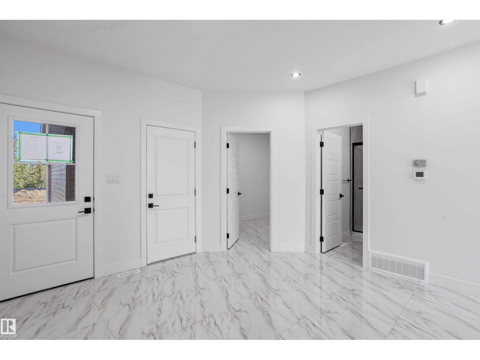 731 158 AV NE - 4
