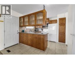 Bedroom - 502 Maplewood Drive, Diamond Valley, AB T0L0H0 Photo 11