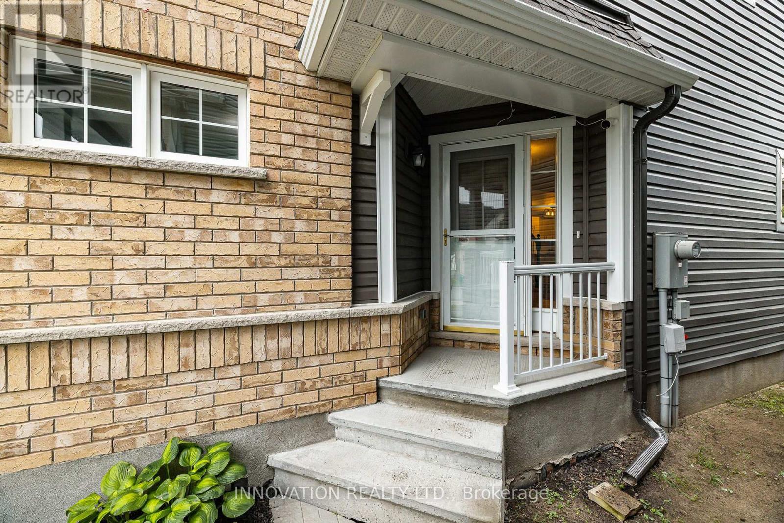Covered front porch with railing