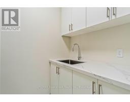 201 - 123 Maurice Drive, Oakville, ON L6K2W6 Photo 10