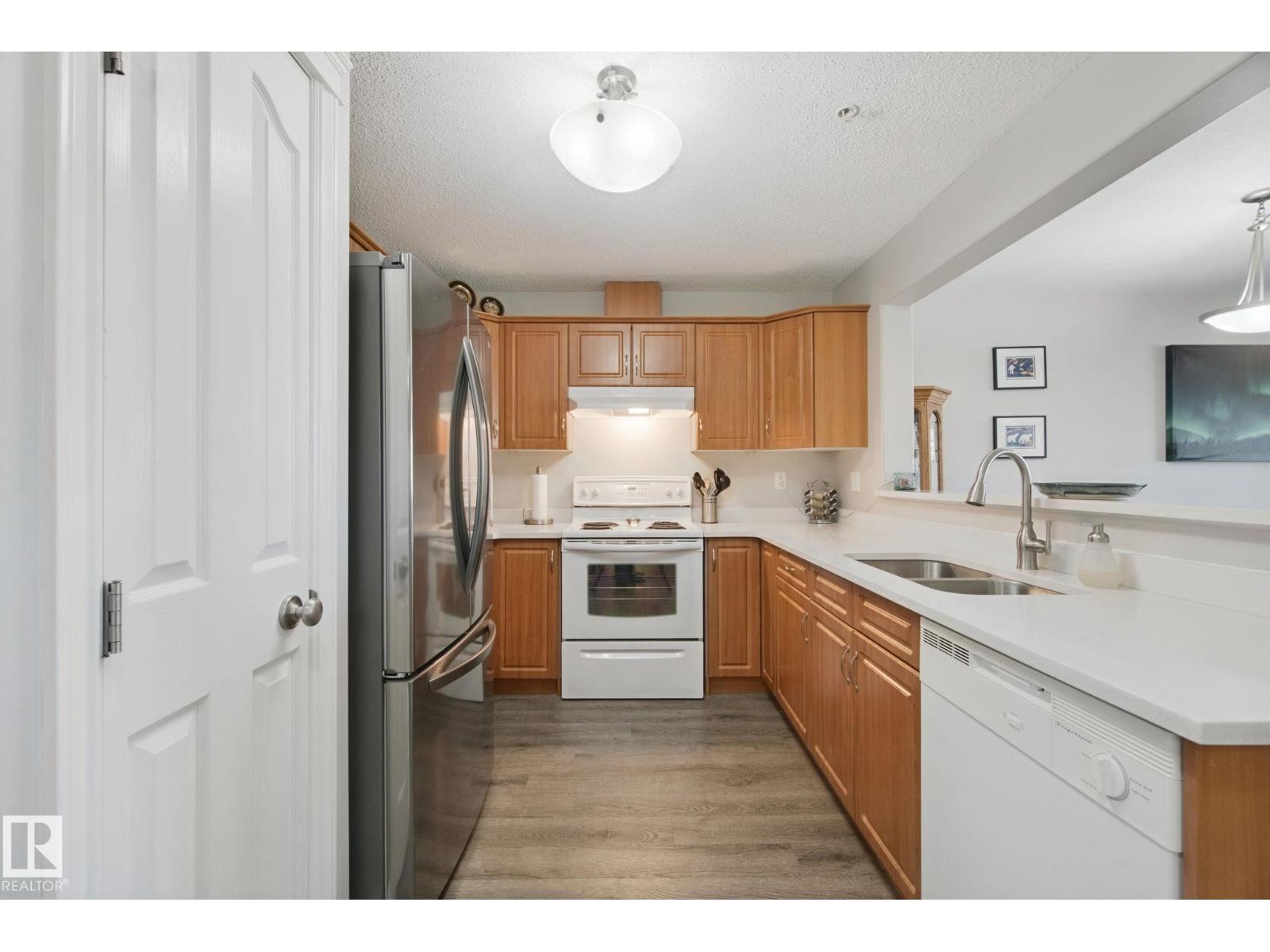 #218 7801 GOLF COURSE RD - Image 11