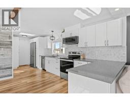 Living room - 64, 1101 84 Street Ne, Calgary, AB T2A7X2 Photo 8