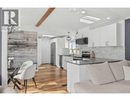 Kitchen - 64, 1101 84 Street Ne, Calgary, AB T2A7X2 Photo 6