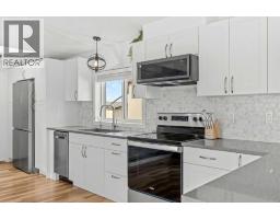 Primary Bedroom - 64, 1101 84 Street Ne, Calgary, AB T2A7X2 Photo 9
