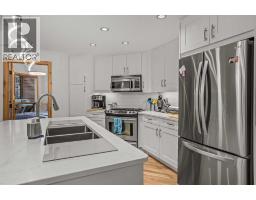 Den - 205, 600 Spring Creek Drive, Canmore, AB T1W0C8 Photo 10