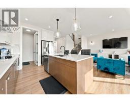 Laundry room - 303 Cornerbrook Drive Ne, Calgary, AB T3N2J3 Photo 14