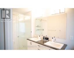 Modern double vanity bathroom with walk-in shower - 352 Appalachian Circle Ottawa