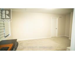 Room with desk, blinds, and white door - 352 Appalachian Circle Ottawa