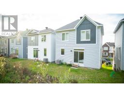 Modern two-story houses with sliding glass doors and vinyl siding - 352 Appalachian Circle Ottawa
