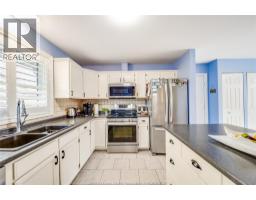 Family room/Fireplace - 26 Cheyenne Court, Leamington, ON N8H5E3 Photo 13