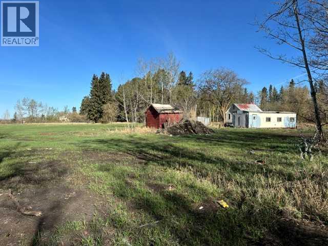 Southeast corner of acreage viewing Northwest