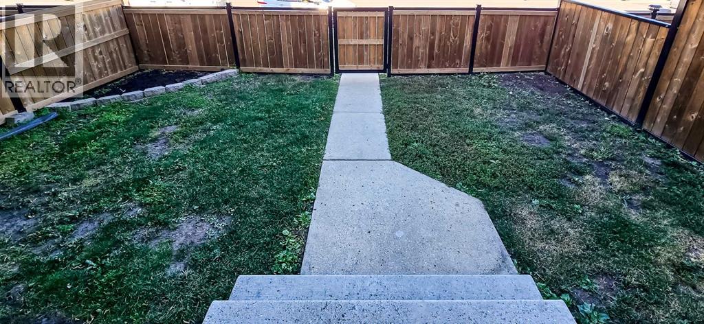 Fenced front yard - West facing