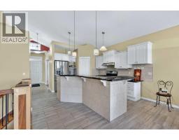 Family room - 118 Invermere Drive, Chestermere, AB T1X1L1 Photo 13