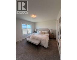 Bedroom - 205, 4115 206 Avenue Se, Calgary, AB T3M4K3 Photo 10