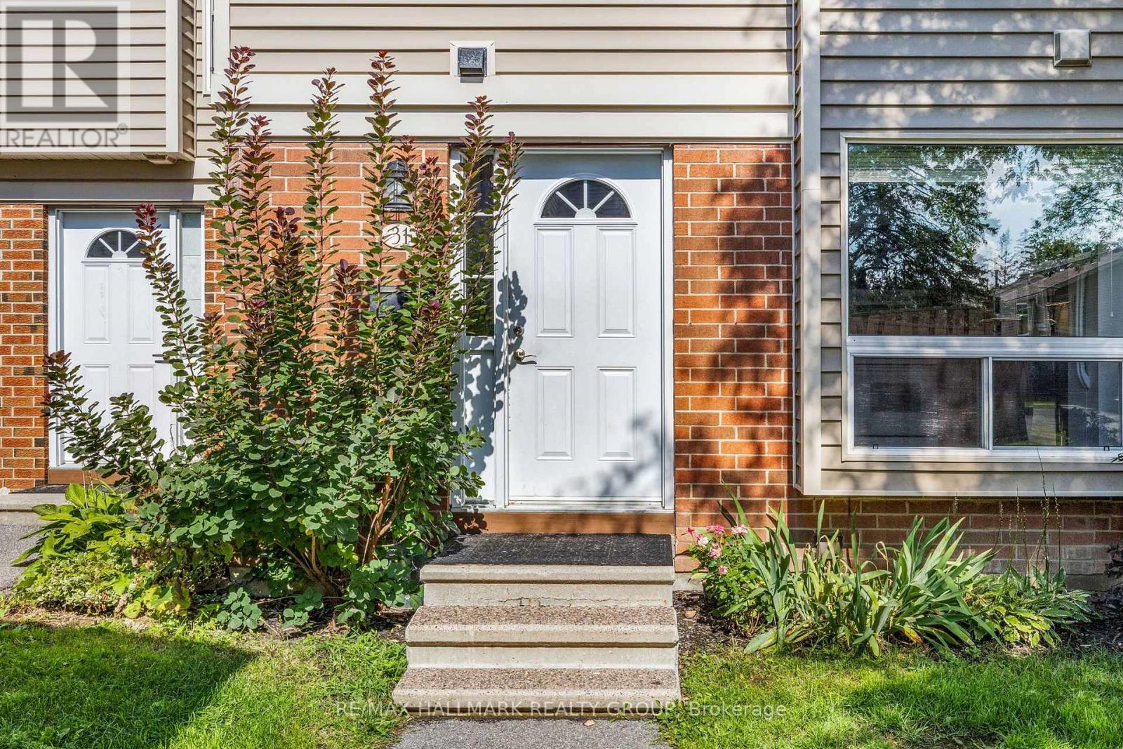 Front entry with landscaped garden beds