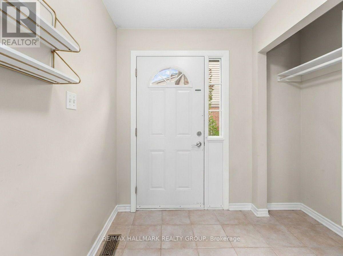 Spacious foyer with open coat storage