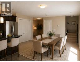 Primary Bedroom - 304, 141 Mountain Street, Cochrane, AB T4C1Z5 Photo 6