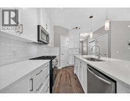 2pc Bathroom - 97 Seton Manor Se, Calgary, AB T3M2V2 Photo 6