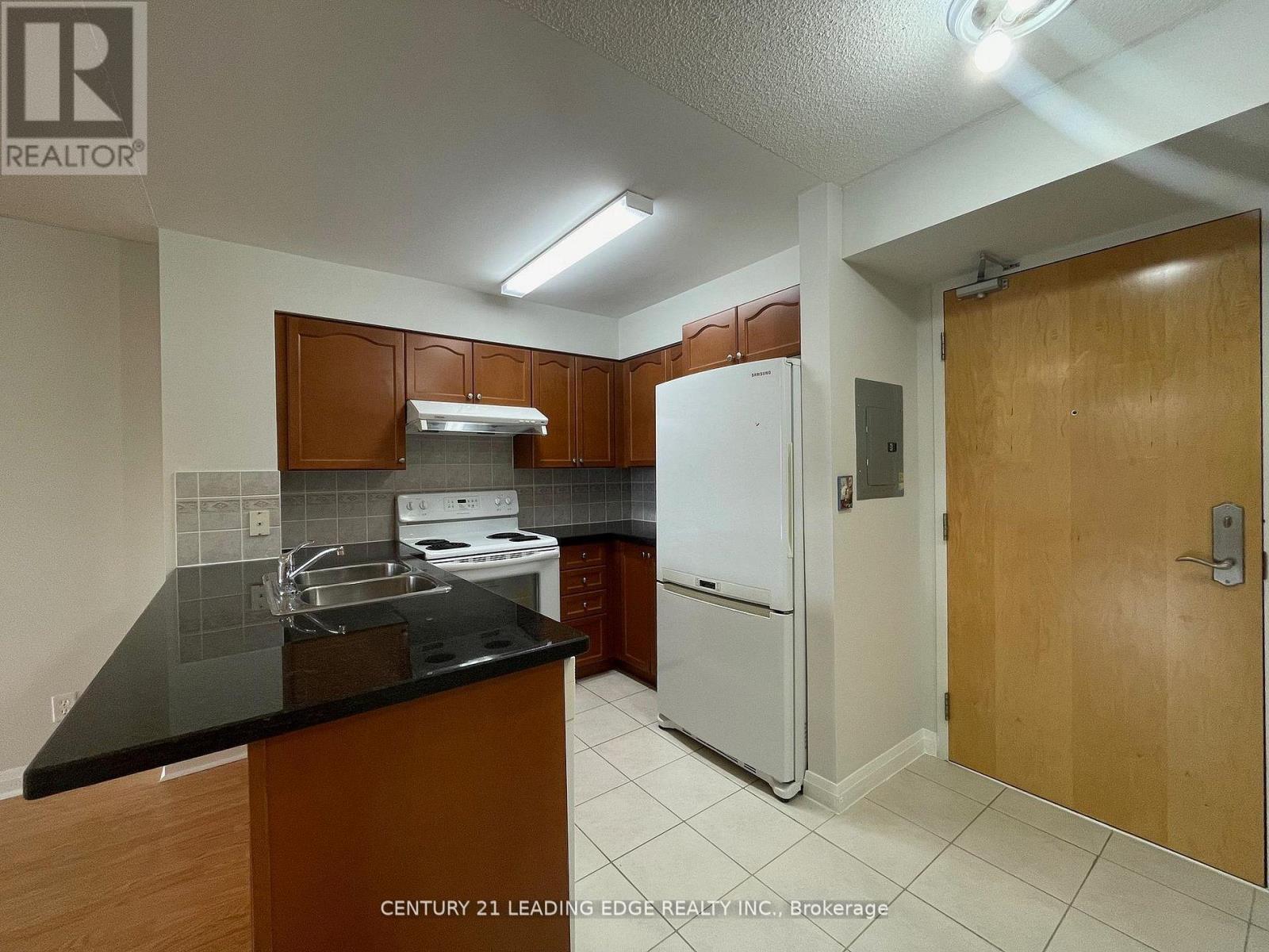 #502 7373 KENNEDY ROAD - 7