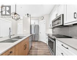 Kitchen - 120, 10 Walgrove Walk Se, Calgary, AB T2X4E3 Photo 8