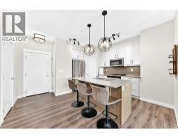 Laundry room - 120, 10 Walgrove Walk Se, Calgary, AB T2X4E3 Photo 6