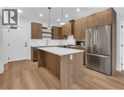 Living room - 1204, 520 Reynolds Avenue Sw, Airdrie, AB T4B5X9 Photo 9