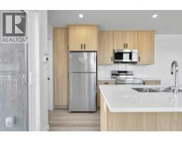 4903 Bowness Road NW - photo 2