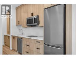 4907 Bowness Road NW - photo 28