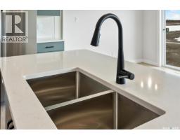 Laundry room - 914 Yuel Bend, Saskatoon, SK S7W1L5 Photo 11