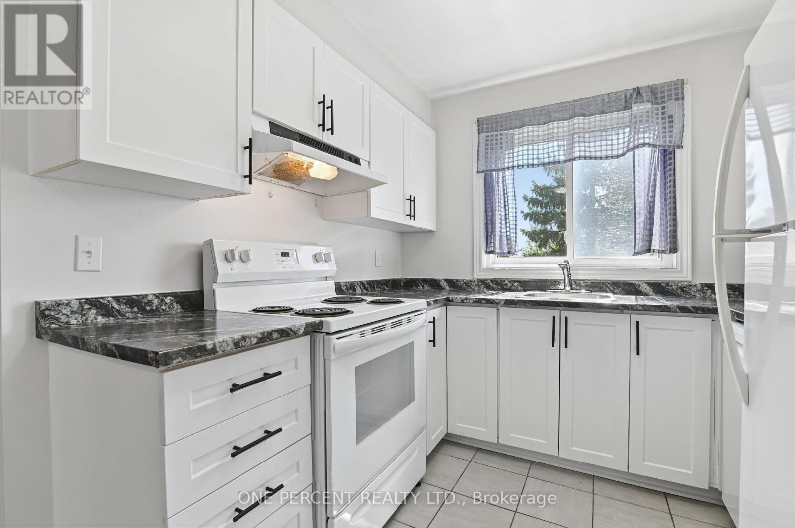 #204 250 BRITTANY DRIVE - Image 11