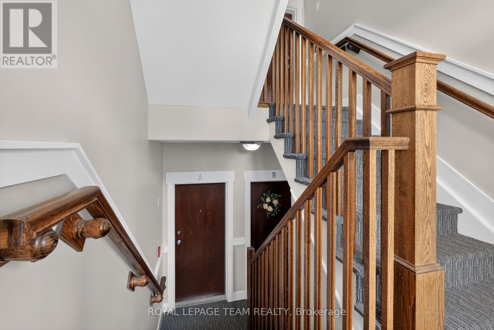 Lower level, walk-up Condo.