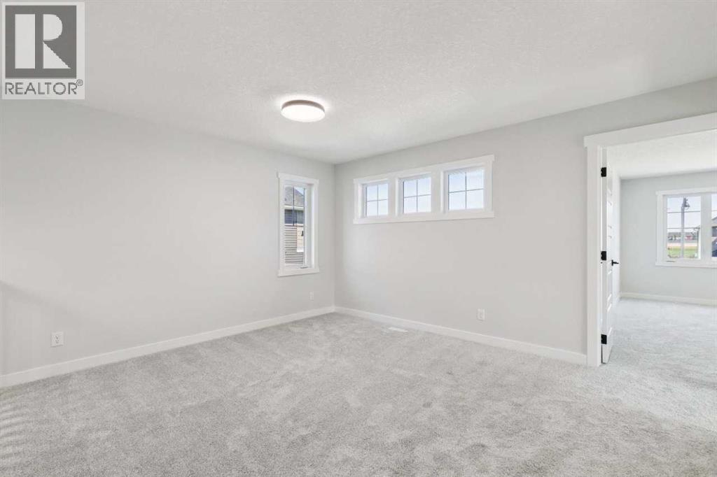 Listing photo – 245 Dawson Wharf Crescent, Chestermere