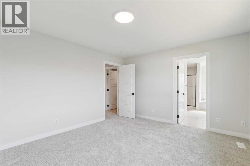 Listing photo – 245 Dawson Wharf Crescent, Chestermere