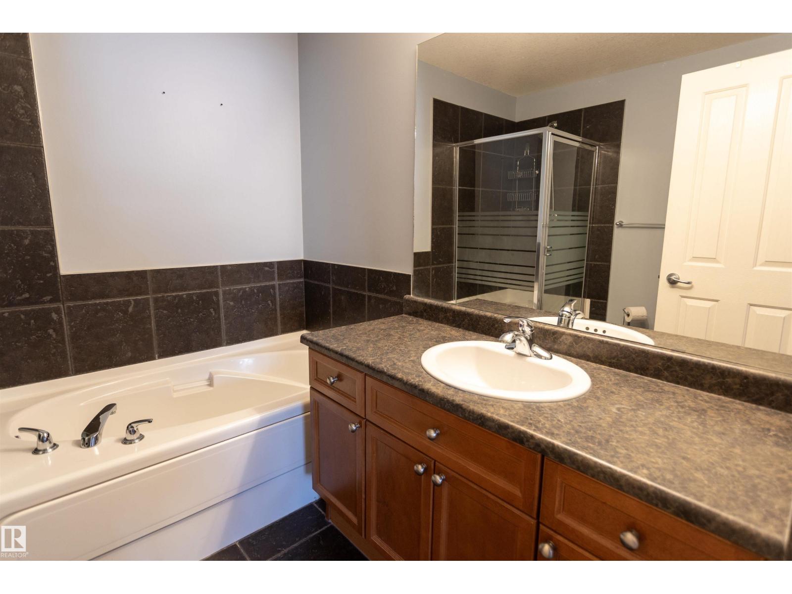 #25 7293 SOUTH TERWILLEGAR DR NW - 19