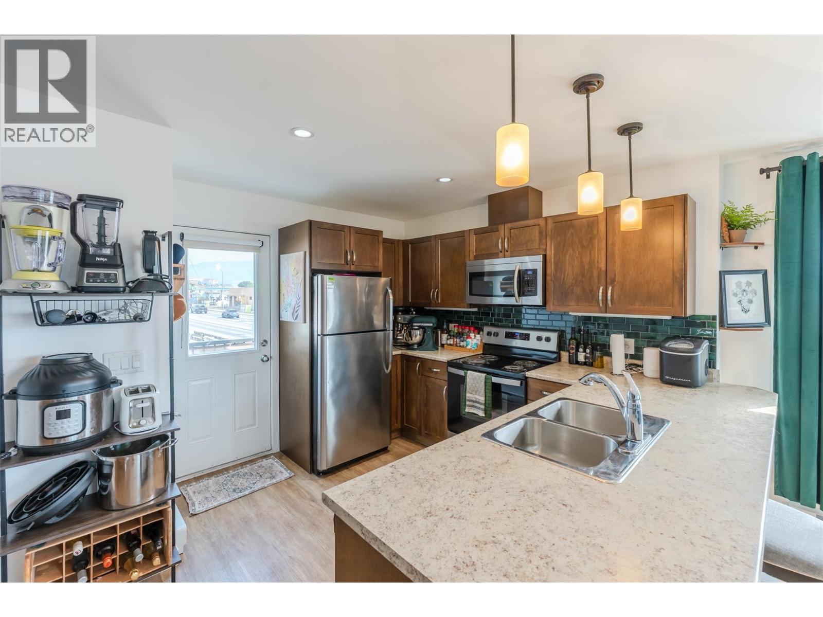 #102 707 REVELSTOKE Avenue - 4