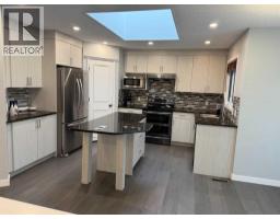 Living room - 376 Sunlake Road Se, Calgary, AB T2X3H4 Photo 6