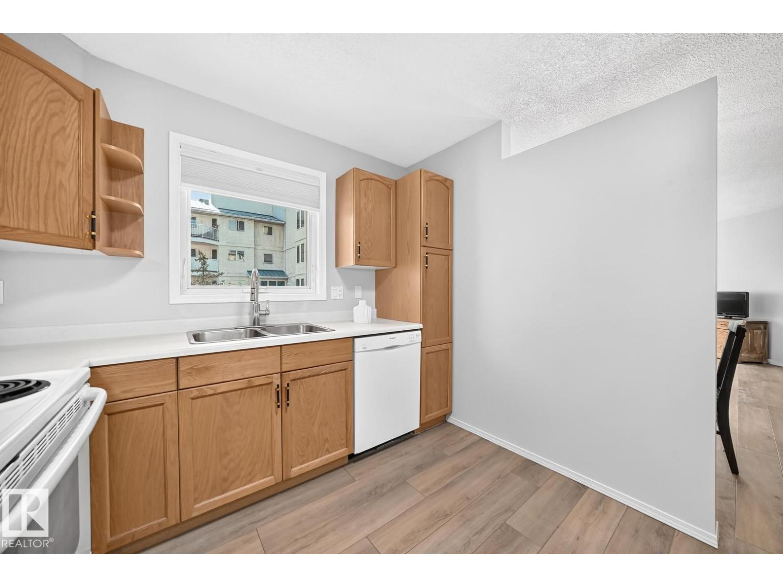 #208 2520 52 ST NW - 10