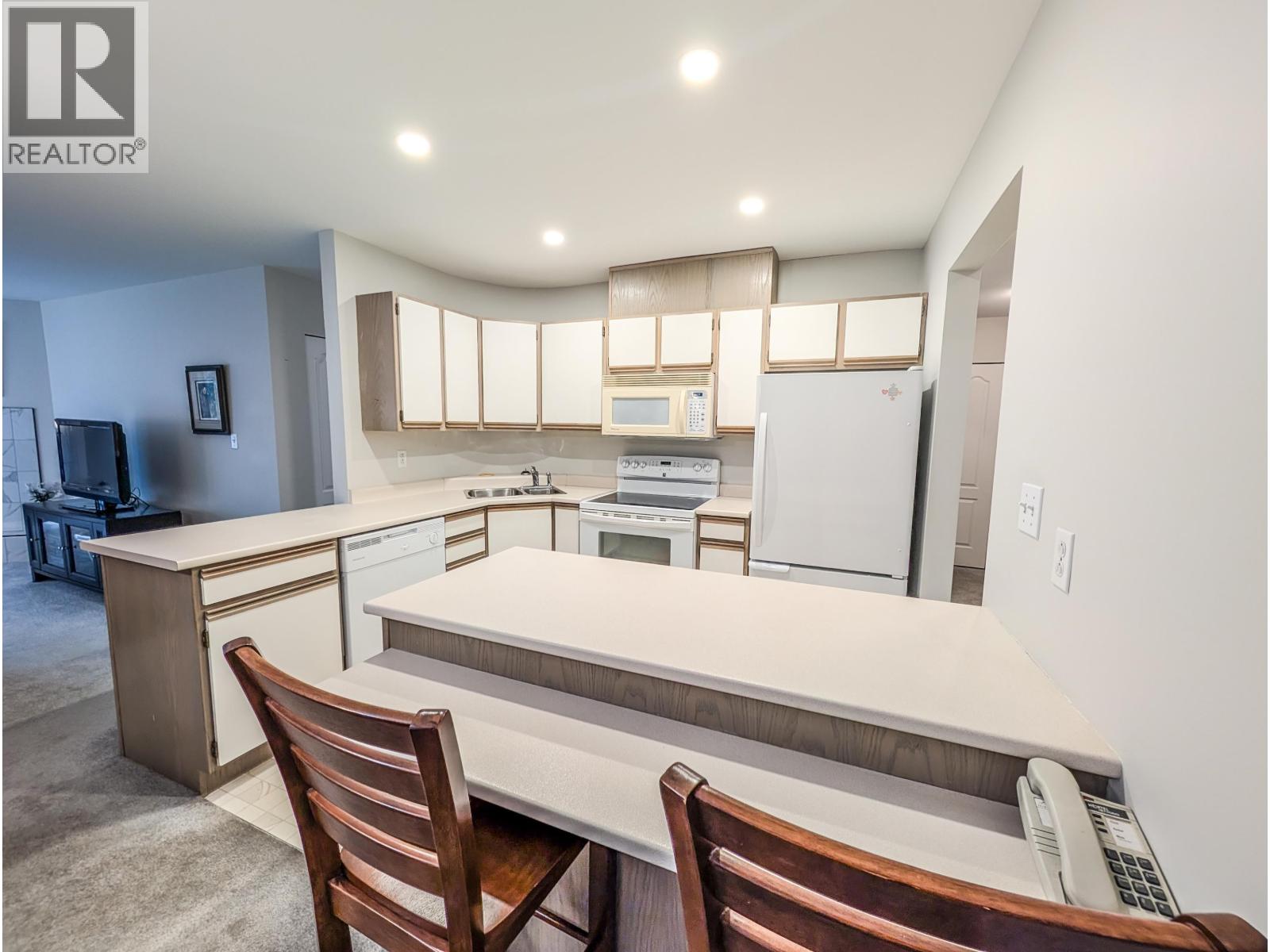 Primary bedroom of 105 7255 SOUTHRIDGE AVENUE · Prince George, BC