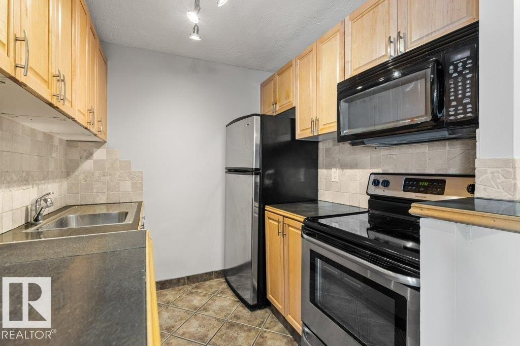 #303 10045 117 ST NW - 15