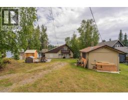 Primary bedroom of 25635 NESS LAKE ROAD · Prince George, BC