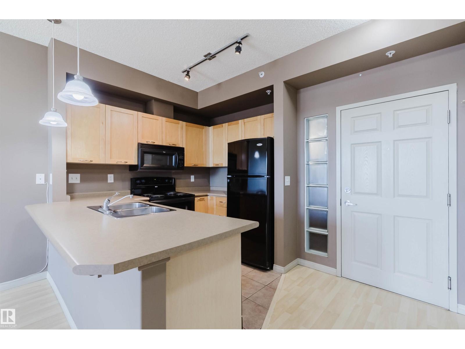 #1-405 4245 139 AV NW - 3