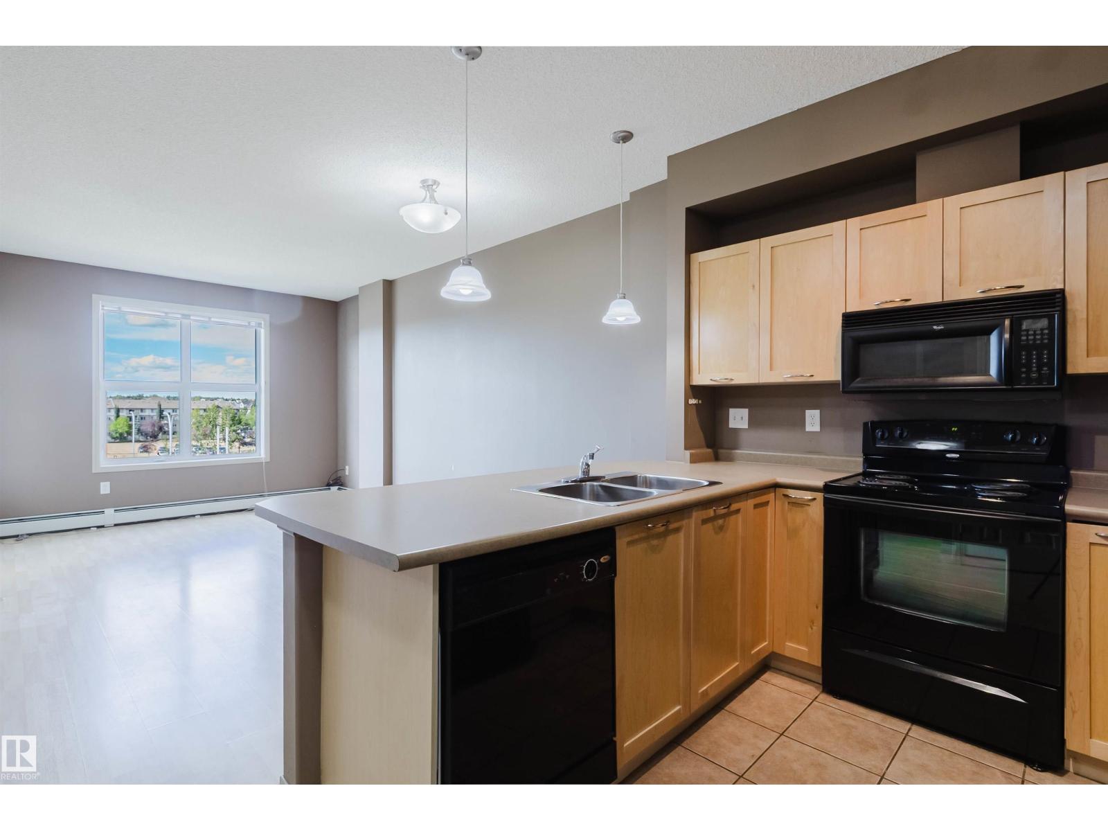 #1-405 4245 139 AV NW - 4