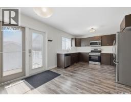 Living room - A&b 5625 Mccaughey Street, Regina, SK S4W0P3 Photo 6