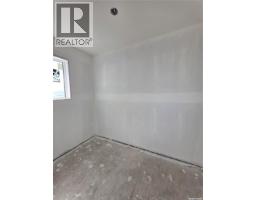 Laundry room - 706 Nazarali Union, Saskatoon, SK S7V1X4 Photo 9