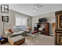 Bedroom - 1302, 800 Yankee Valley Boulevard Se, Airdrie, AB T4A2L3 Photo 7